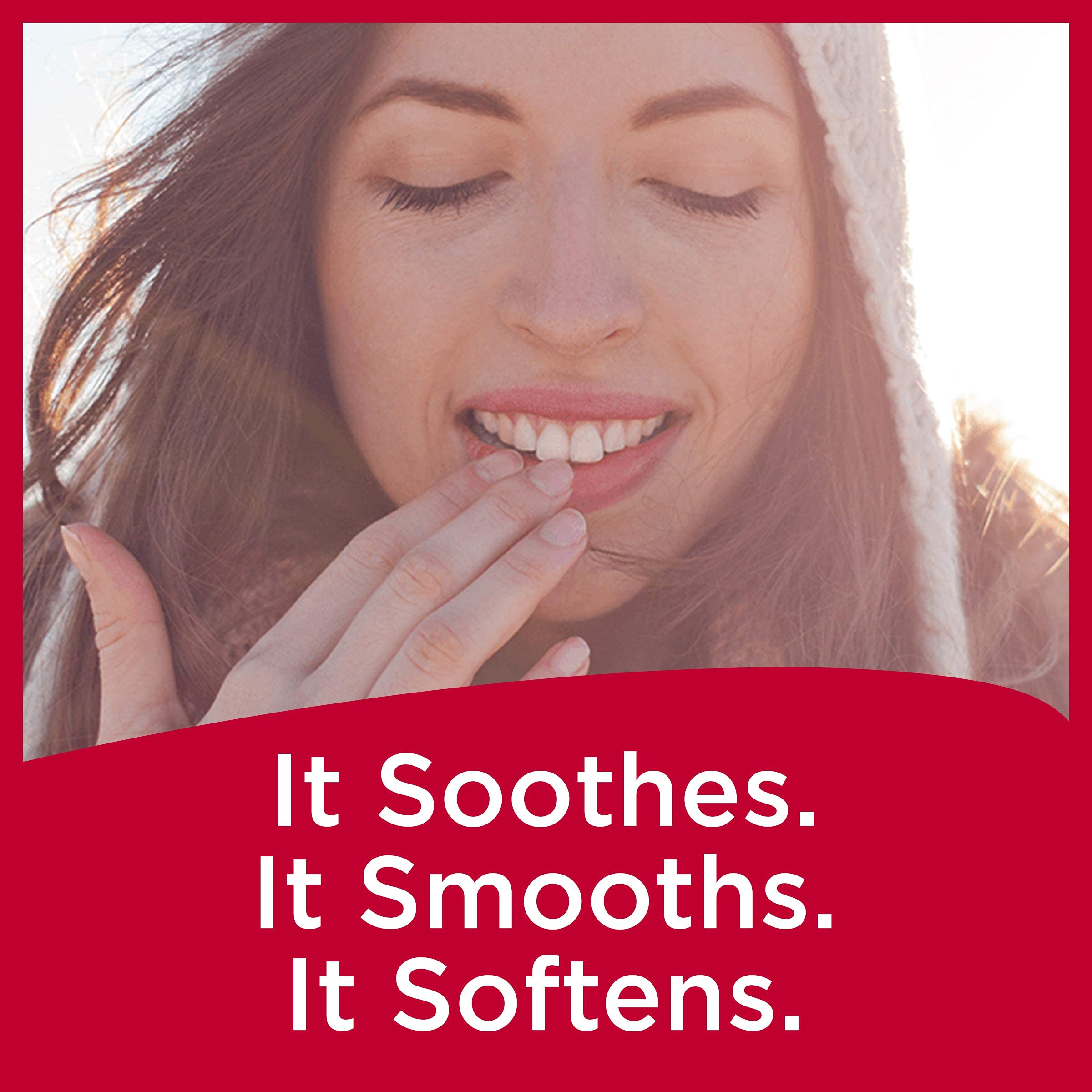 Carmex Daily Care Minis Fresh Cherry tube close-up with vibrant flavor.