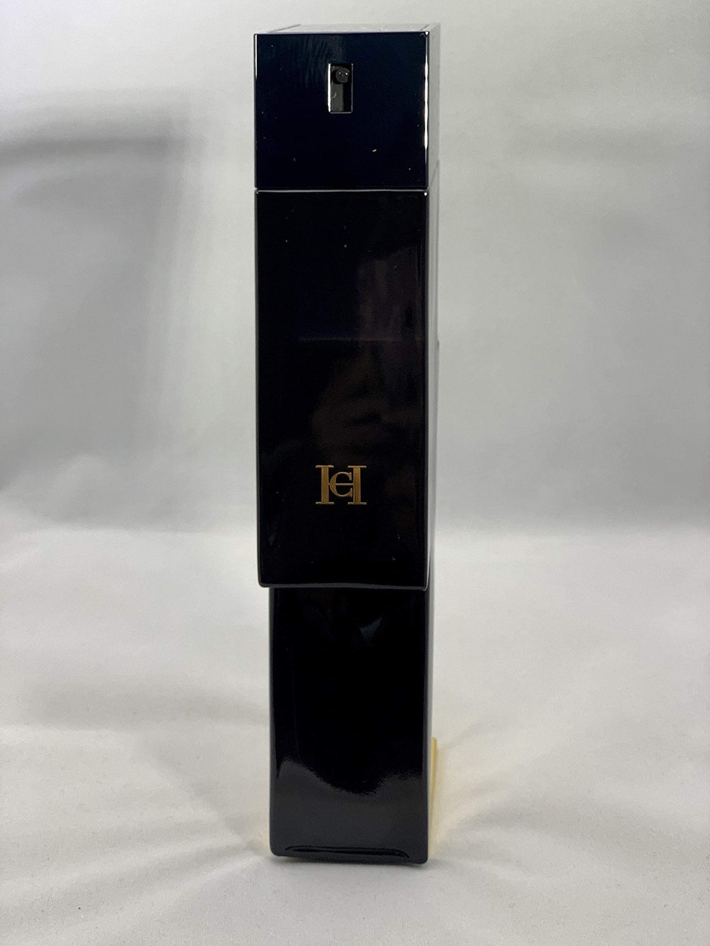 Carolina Herrera Bad Boy EDT spray application captures quick, easy fragrance touch-ups.