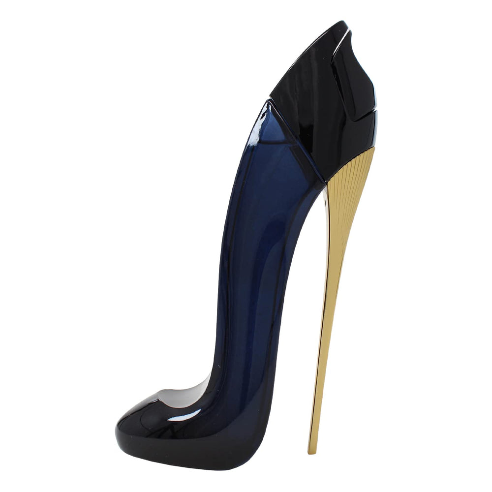 Carolina Herrera Good Girl full bottle on surface evokes luxe nighttime fragrance ritual.