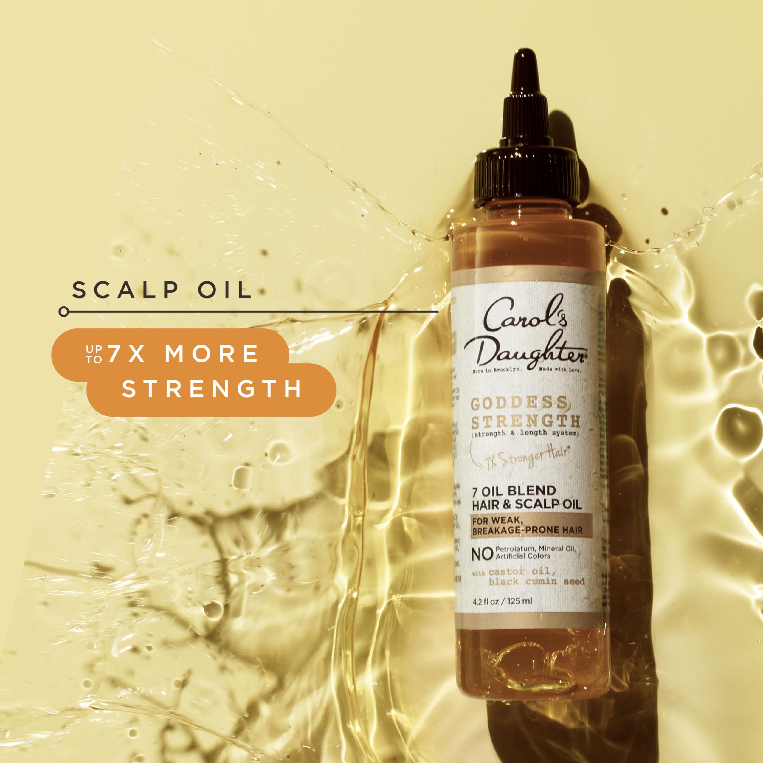 Goddess Strength application tip close-up shows targeted treatment for curls and waves.