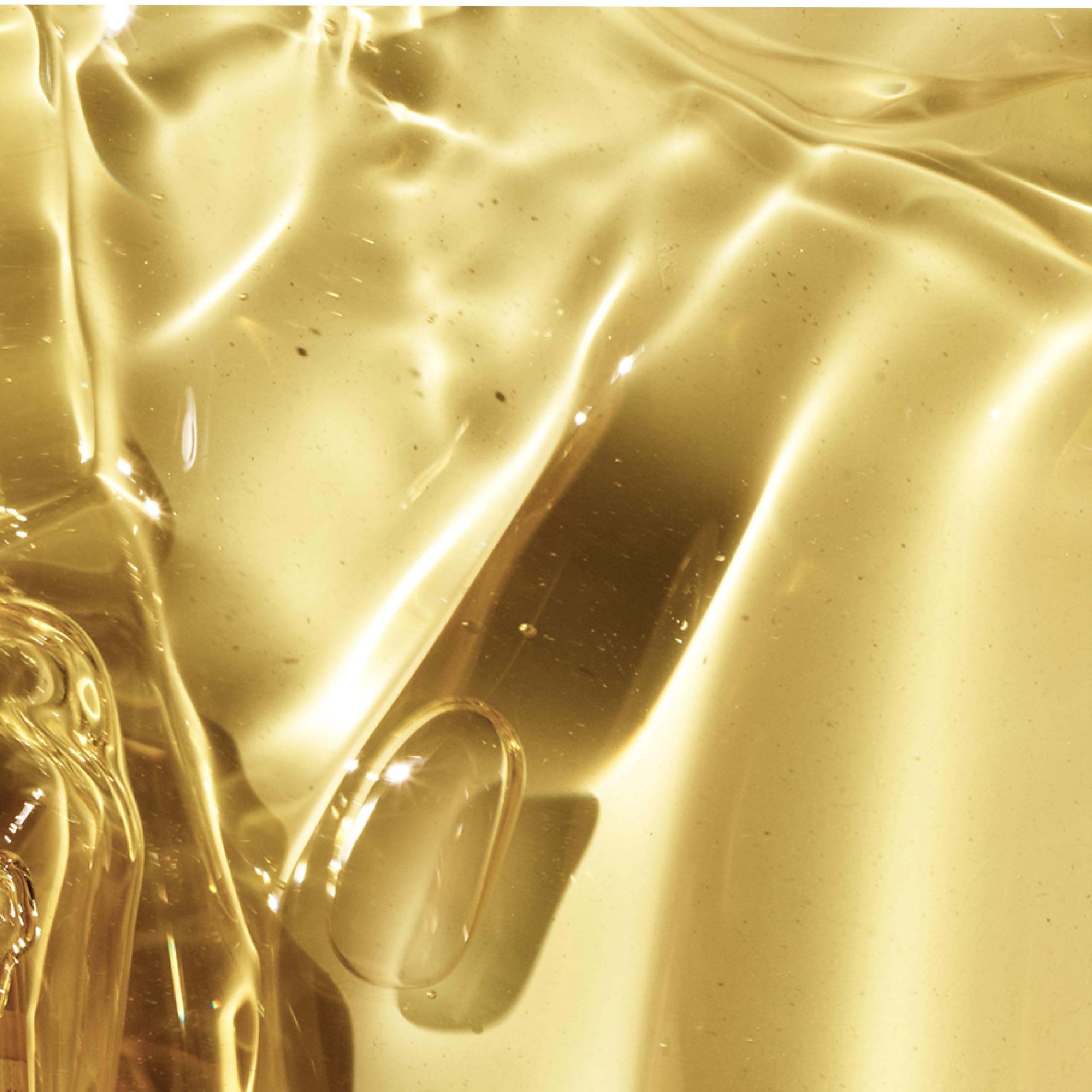 Ingredient-list close-up emphasizes nourishing oils powering hydration and shine.
