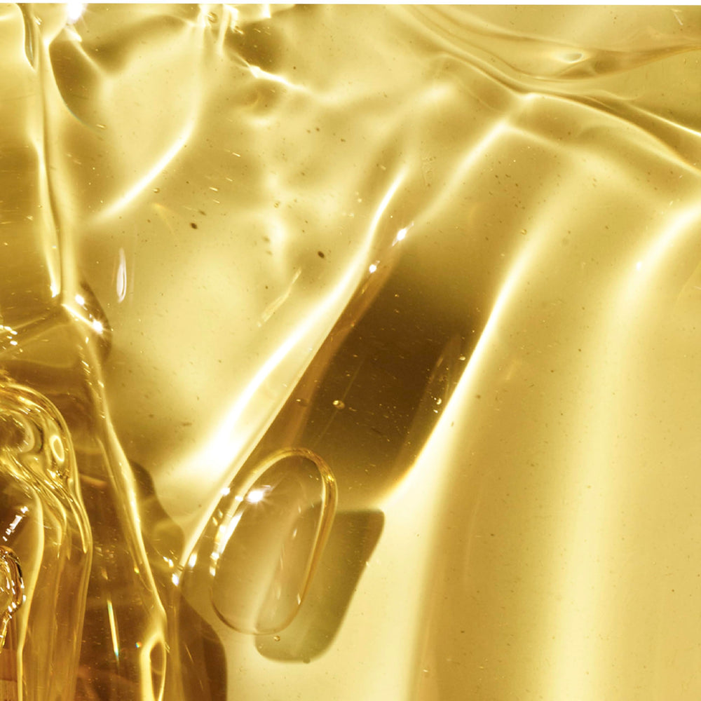 Ingredient-list close-up emphasizes nourishing oils powering hydration and shine.