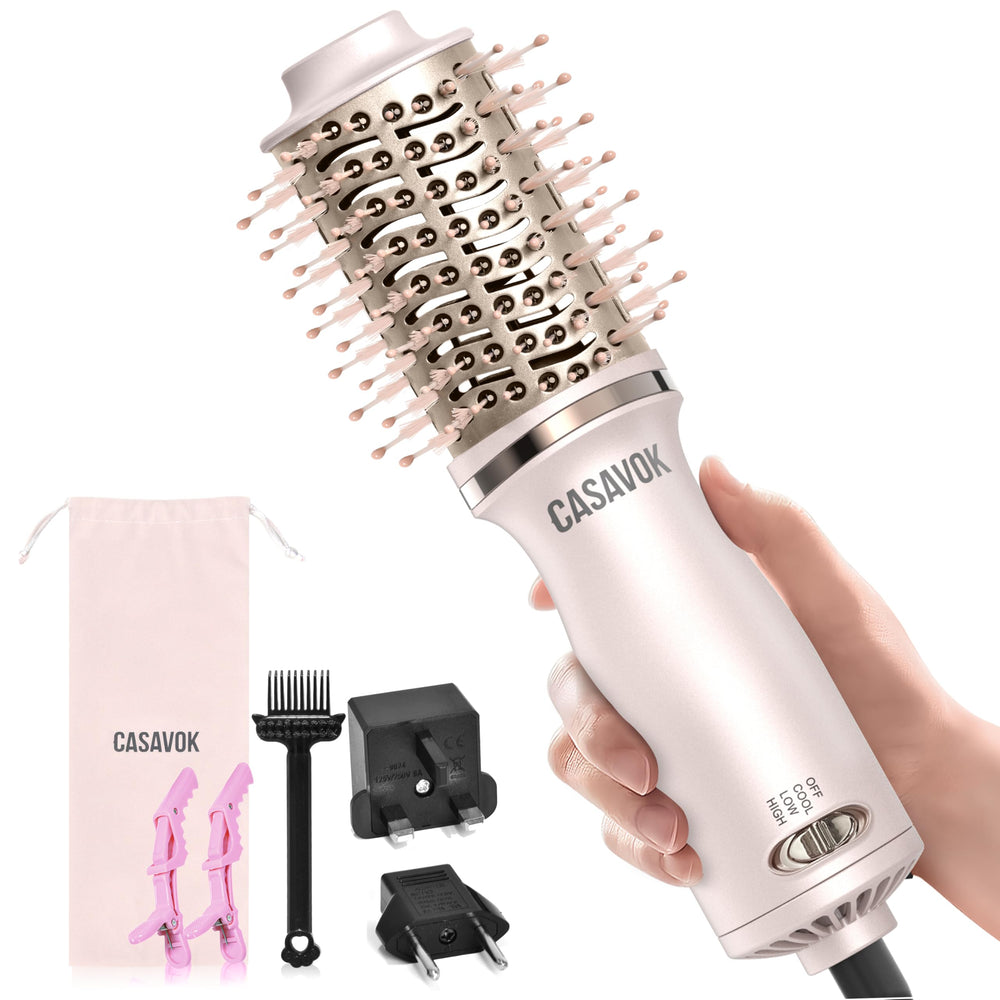 Casavok dual-voltage travel hair dryer brush ready for on-the-go styling with compact design.