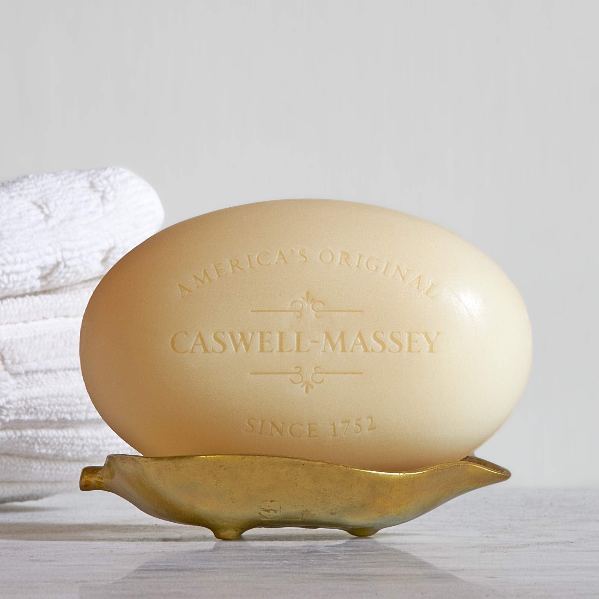 Caswell-Massey Number Six fragrance notes emphasize citrus-rose-clove-amber profile.