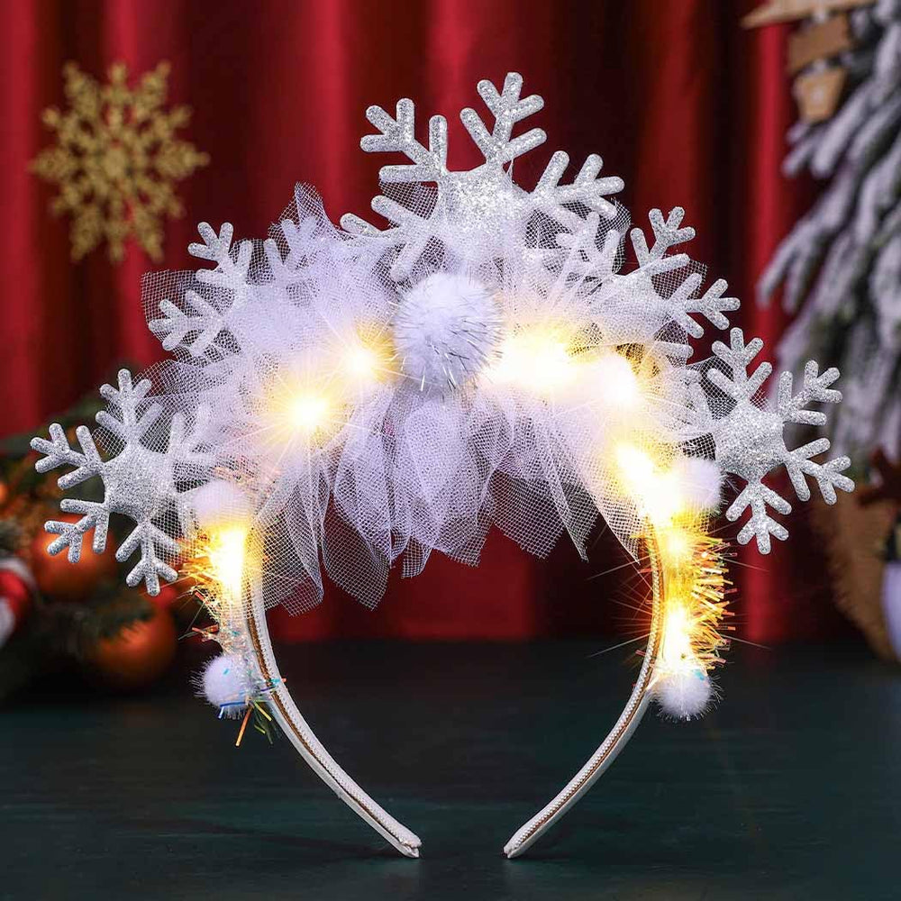 Catery light-up snowflake headband white glows for festive photos and parties.
