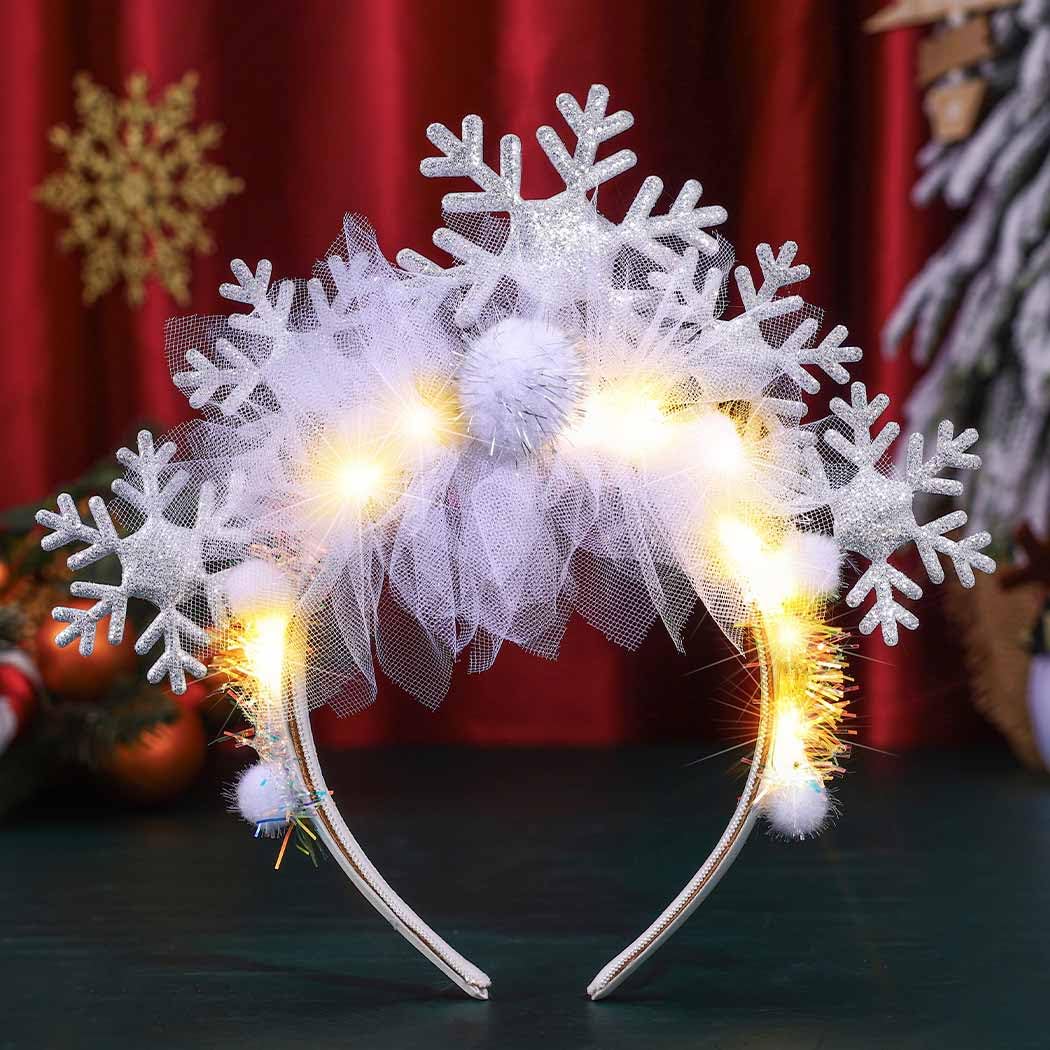 Catery light-up snowflake headband white glows for festive photos and parties.