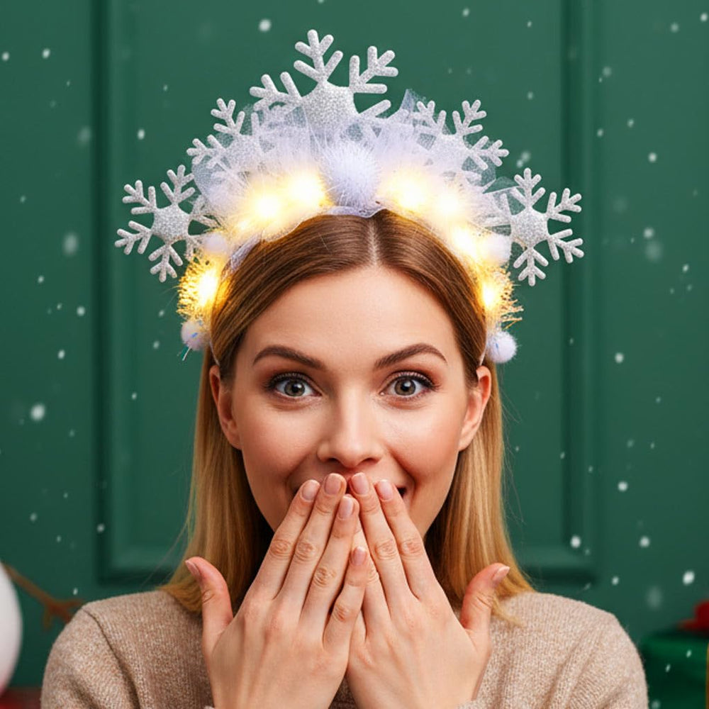 Catery snowflake headpiece LED glow close-up shows intricate sparkle.