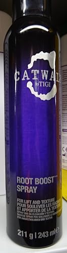 Catwalk by TIGI Root Boost Spray application highlights mousse-like texture for long-lasting style.