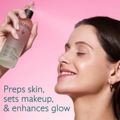 Close-up of Caudalie Beauty Elixir bottle to tighten pores.