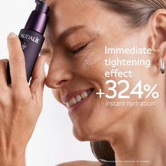 Caudalie Premier Cru serum application on face promotes smoother, refreshed skin.