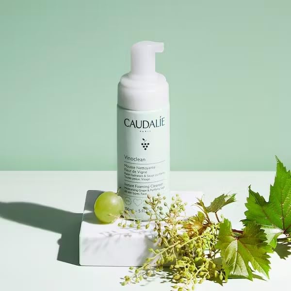 Caudalie Vinoclean usage on damp skin demonstrates circular massage technique.