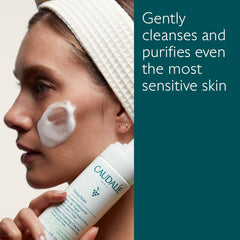 Caudalie Vinoclean Gentle Foaming Cleanser pump close-up showing airy foam