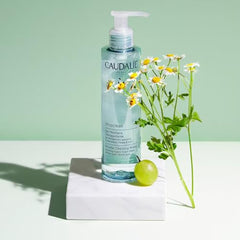 Caudalie Vinoclean Micellar Cleansing Water eye makeup removal on cotton pad for easy cleansing.