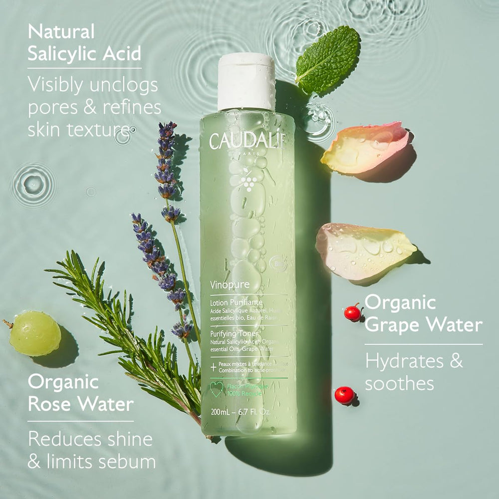 Close-up Caudalie Vinopure bottle with grapes and roses to show soothing ingredients.