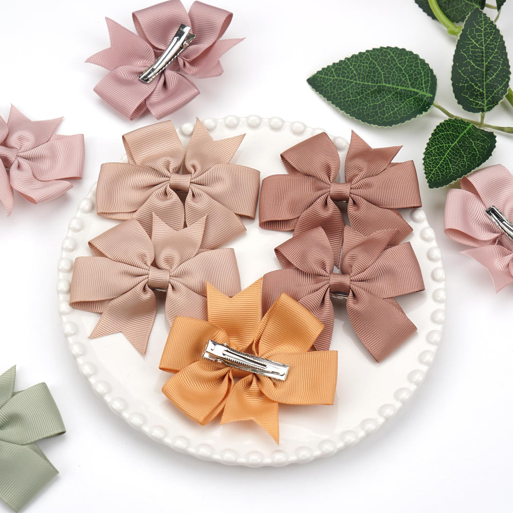 CÉLLOT 70-piece bows set in matching color pairs.