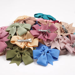 CÉLLOT durable metal clip hair bow keeps hair in place.