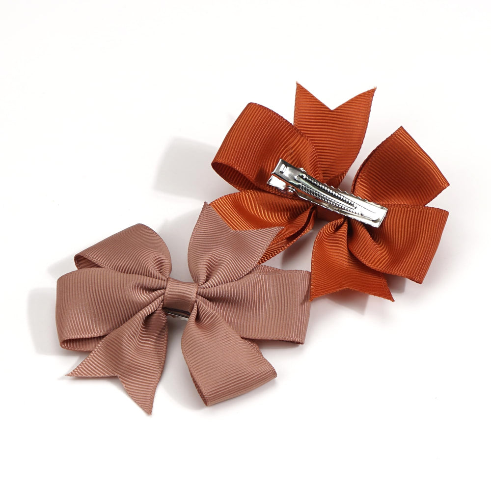 CÉLLOT matching colors bows ideal for coordinating outfits.