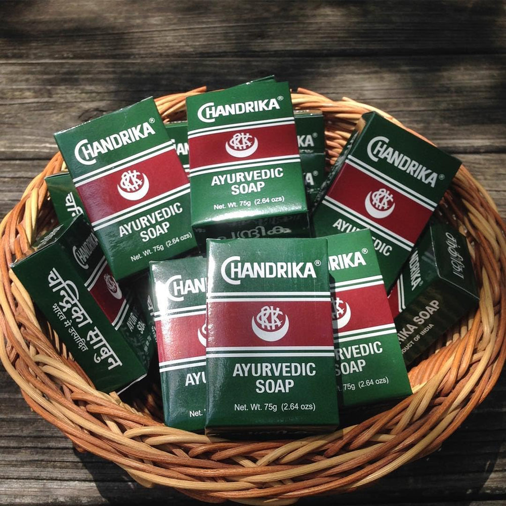 Chandrika soap lather closeup—rich foam for refreshing cleansing.