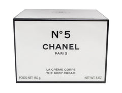 CHANEL N°5 Body Cream jar reveals rich texture for everyday moisturization.