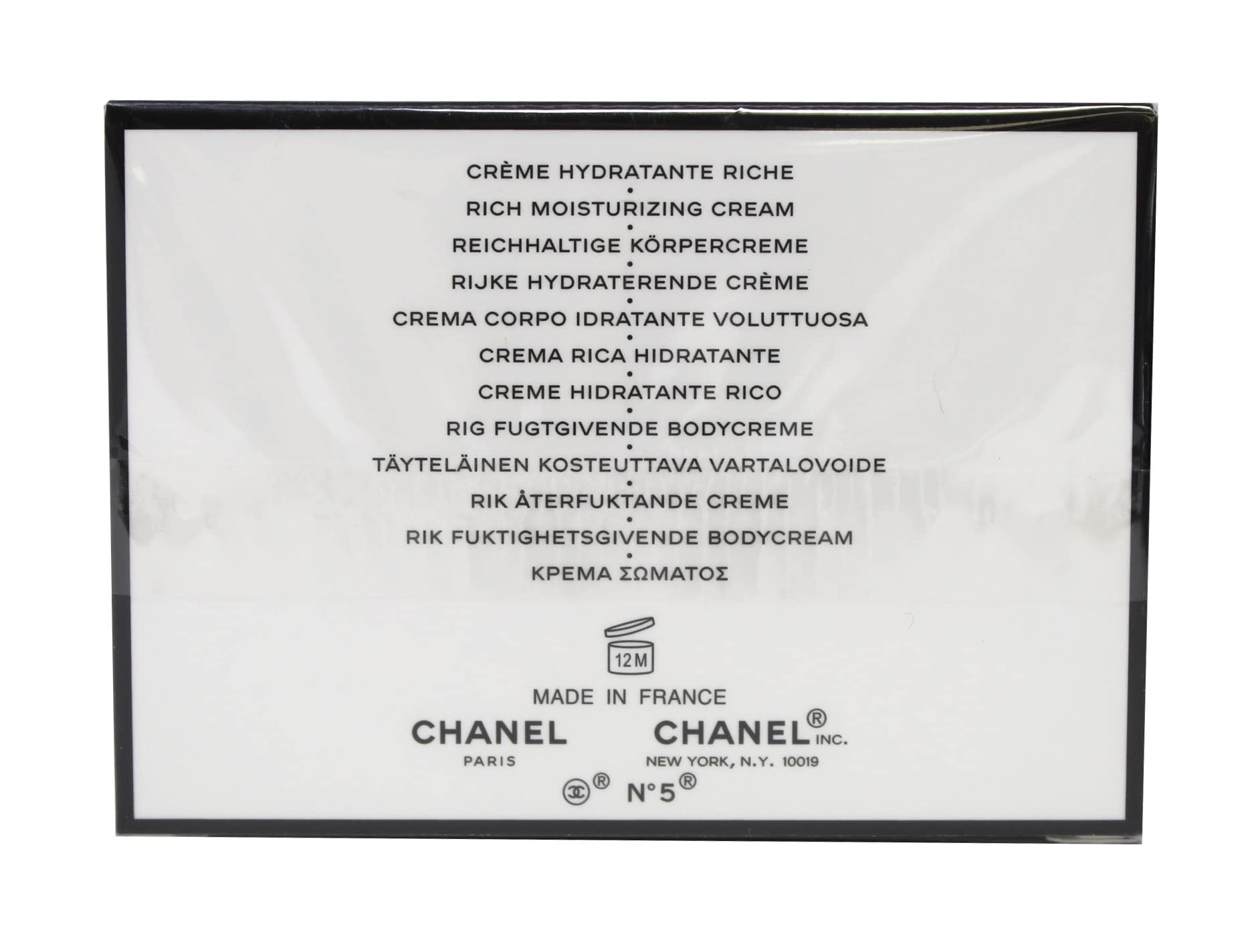 CHANEL N°5 body cream texture close-up emphasizes silky moisturizing feel.