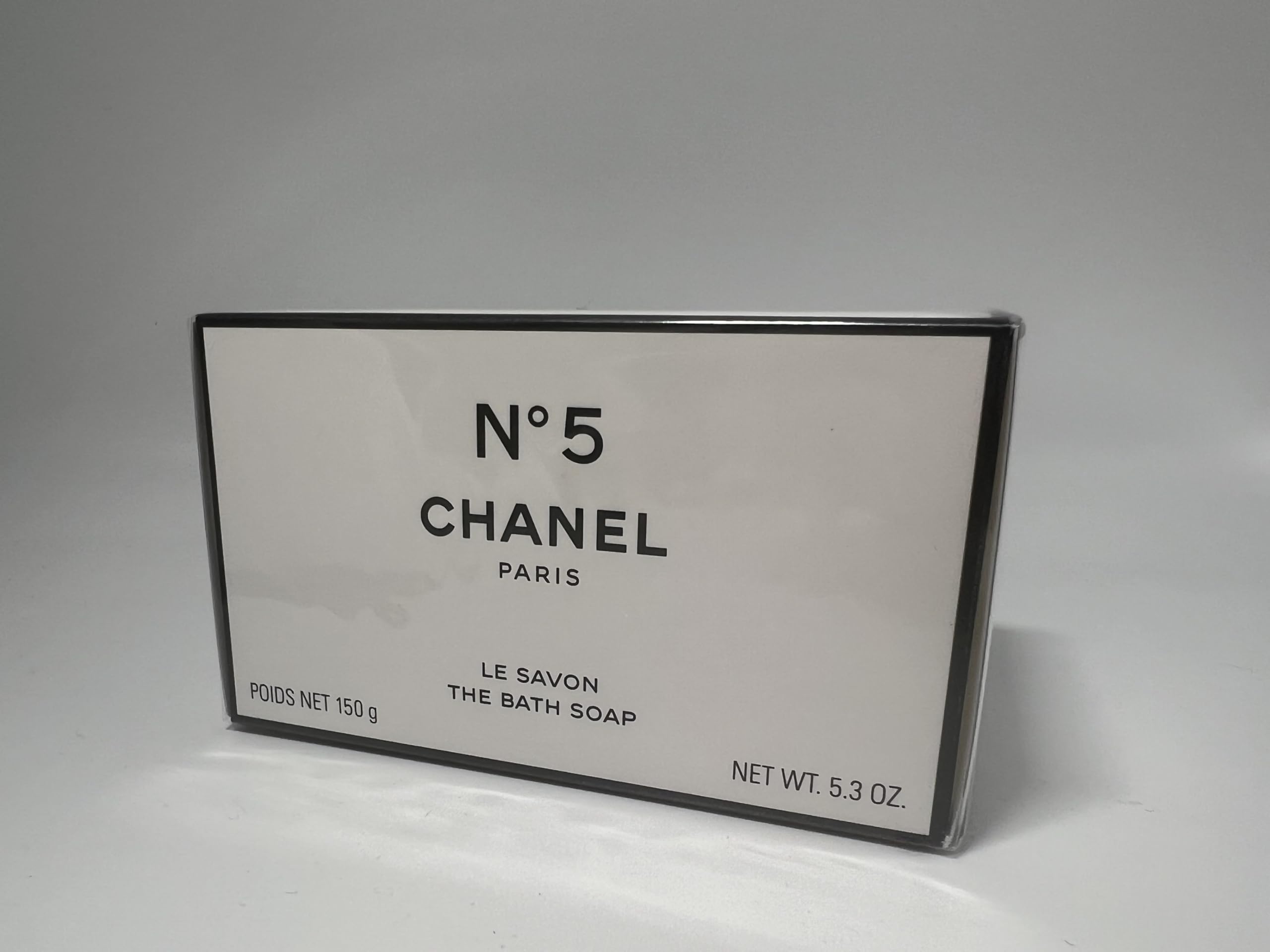 Chanel No 5 bath soap rose note close-up evokes timeless floral elegance.