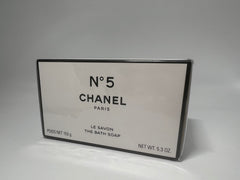 Chanel No 5 bath soap rose note close-up evokes timeless floral elegance.