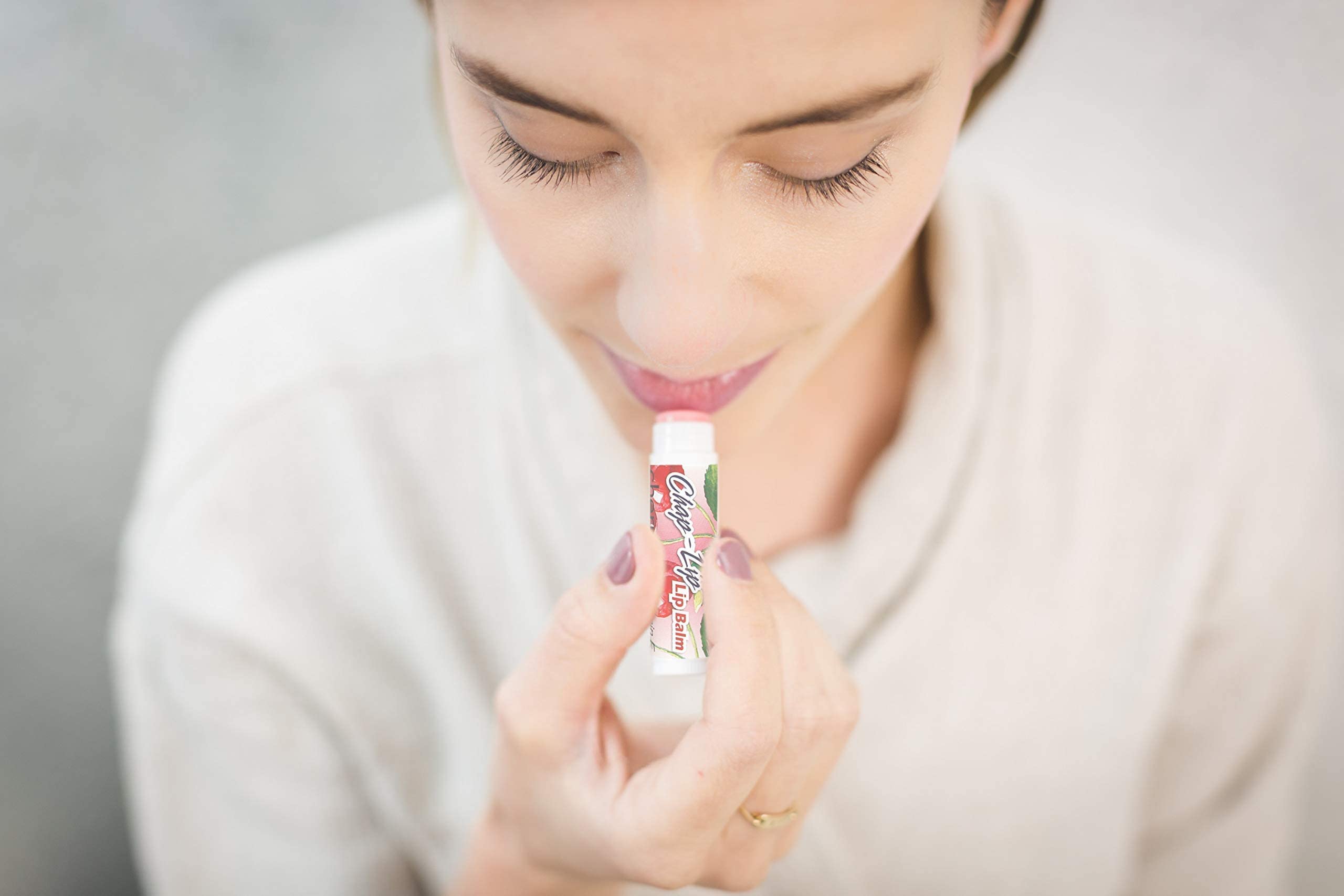Chap-Lip Lip Balm cherries flavor for soothing moisture.
