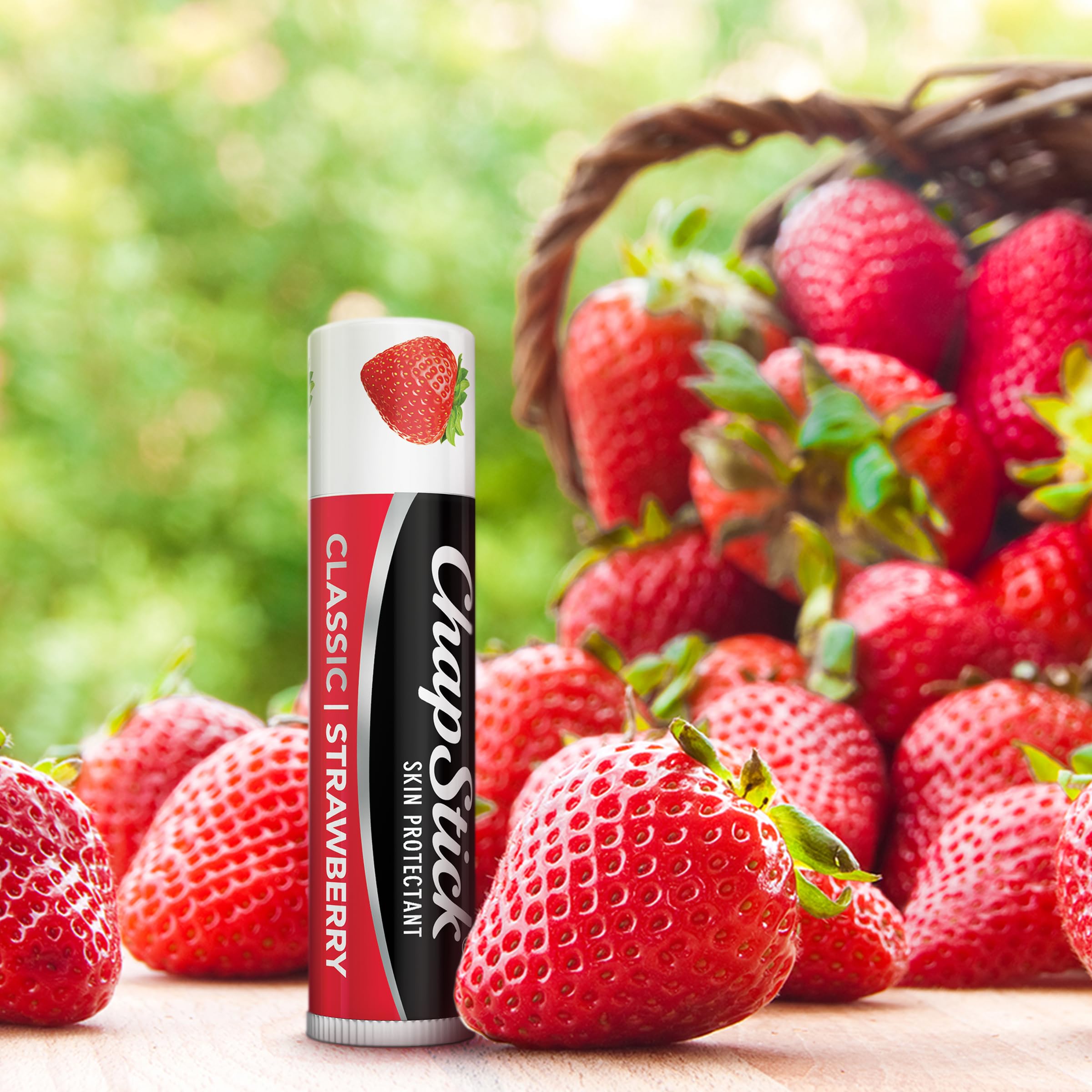 ChapStick Classic Strawberry lip balm tube with cap off for quick reapplication.