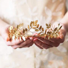 Chargances gold leaf crown wedding photo-ready accessory complements bridal attire