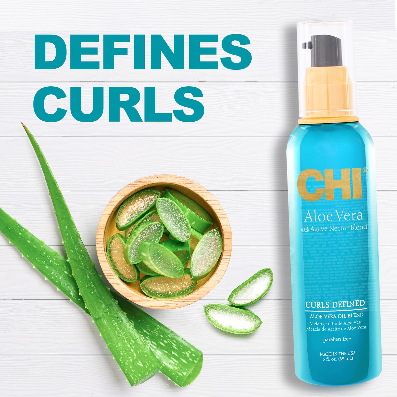 CHI Aloe Vera Oil bottle beside a comb after a shower.