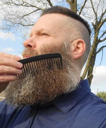 Chicago Comb detangling long curly hair with Model 10's long teeth.
