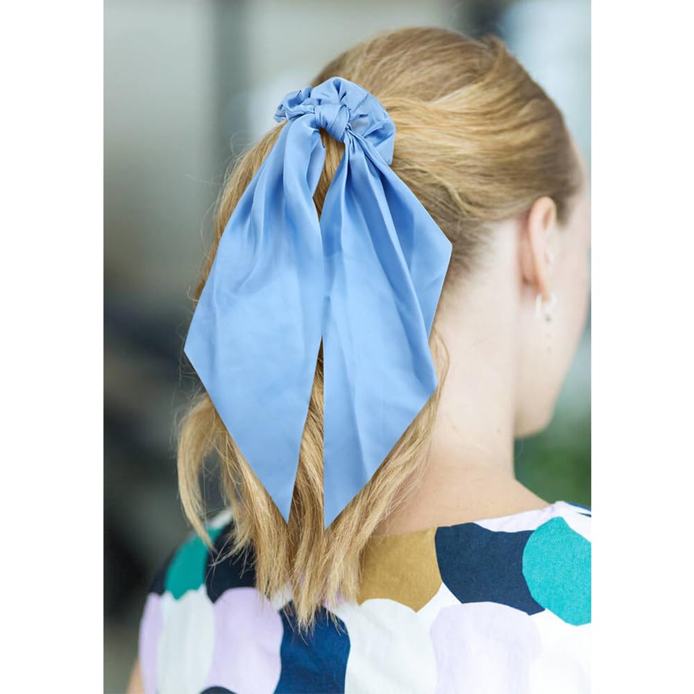 Cinaci long ribbon bow detail adds elegant flair to ponytails.