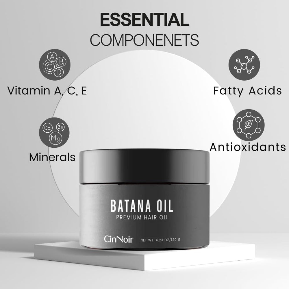 CinNoir Batana Oil pour closeup shows lightweight texture ideal for scalp care.