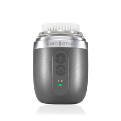 Clarisonic Alpha FIT men's face brush in grey from the front with ergonomic handle.