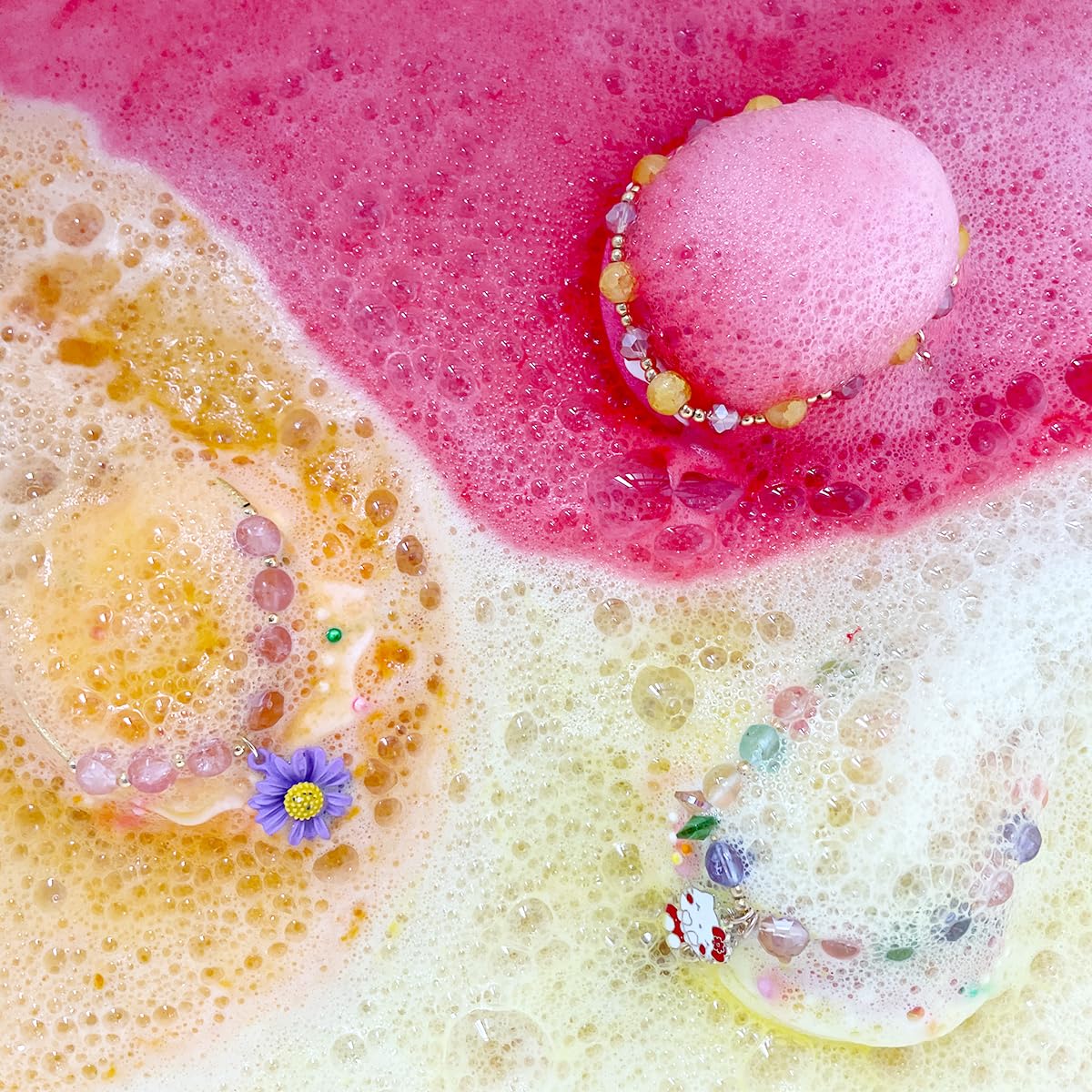 Clear and Fresh donut bath bombs in bubbly water for a spa-like soak.