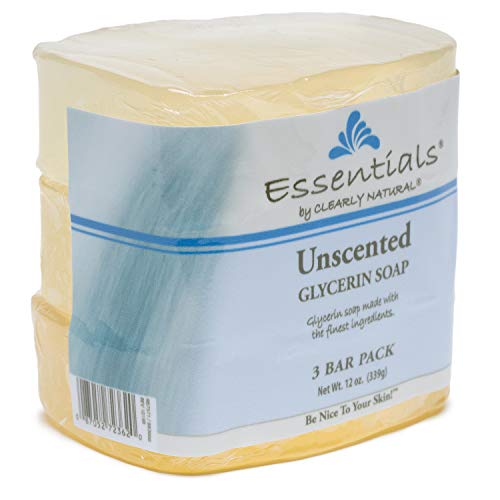 Clearly Natural unscented glycerin bar soap beside a towel conveys everyday comfort.