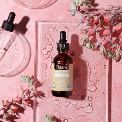 Cliganic Organic Argan Oil glass bottle label emphasizes purity