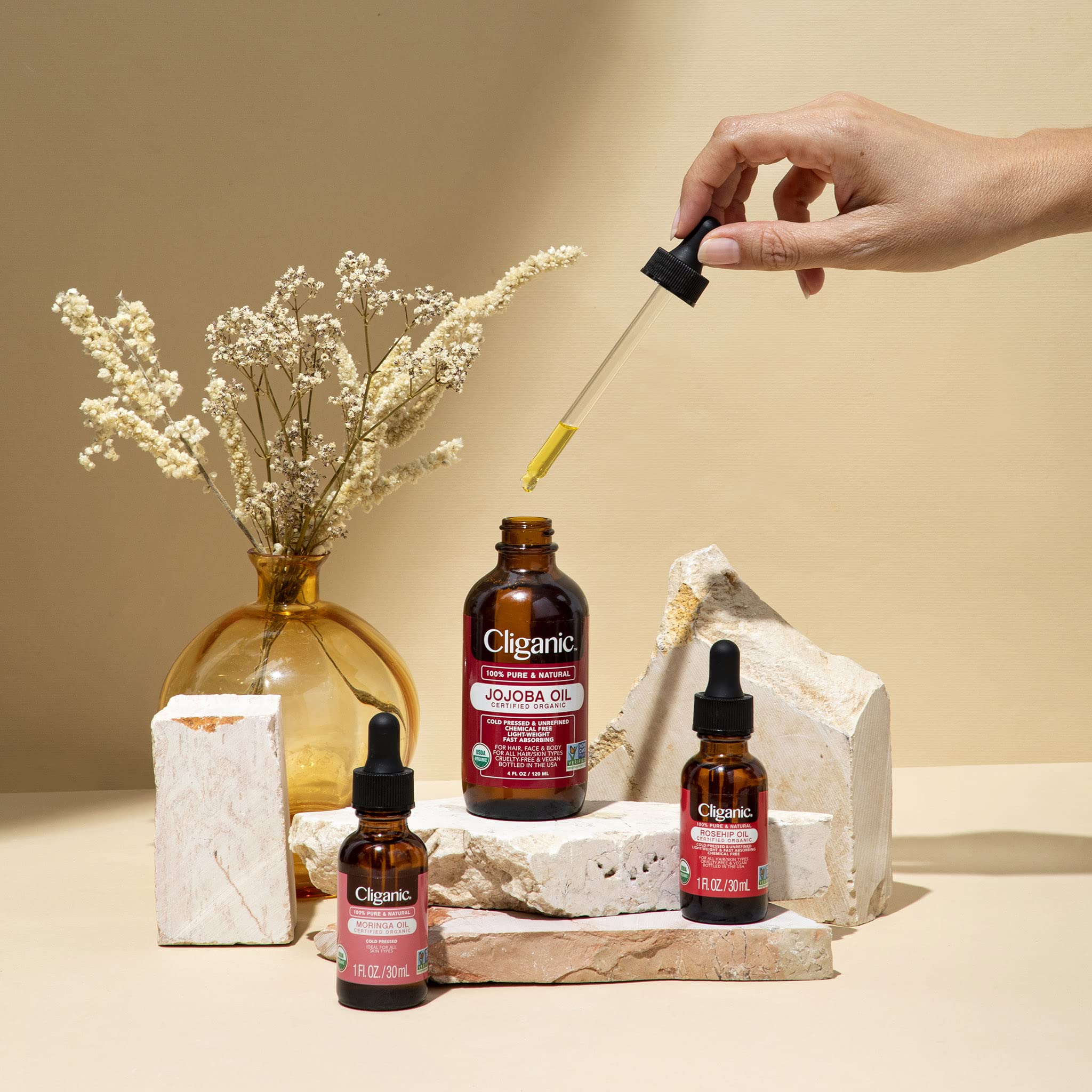 Cliganic Organic Marula Oil application on face for lightweight hydration.