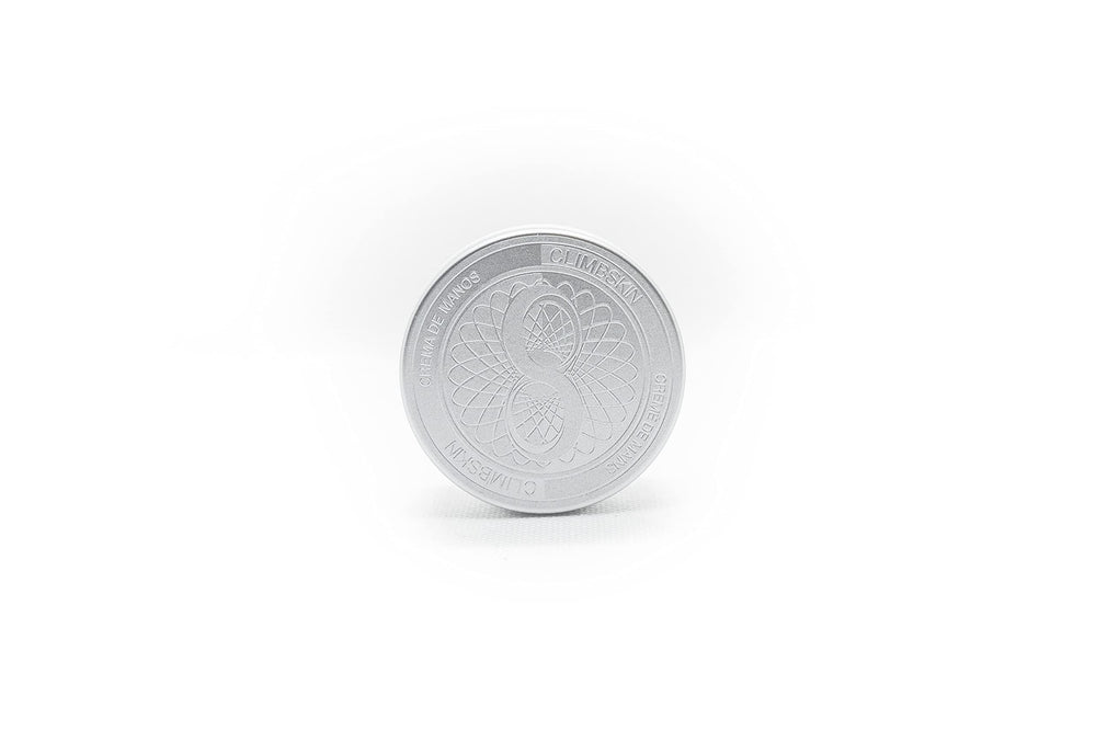 Compact 1 oz Climbskin packaging for on-the-go use.