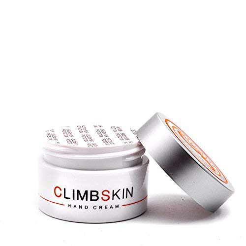 Athlete applies Climbskin to help manage dry, cracked hands during workouts.