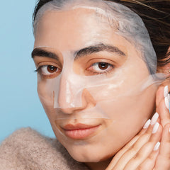 Clinical Resolution CRL Peptide Aqua Gel Mask applying on face for instant calming