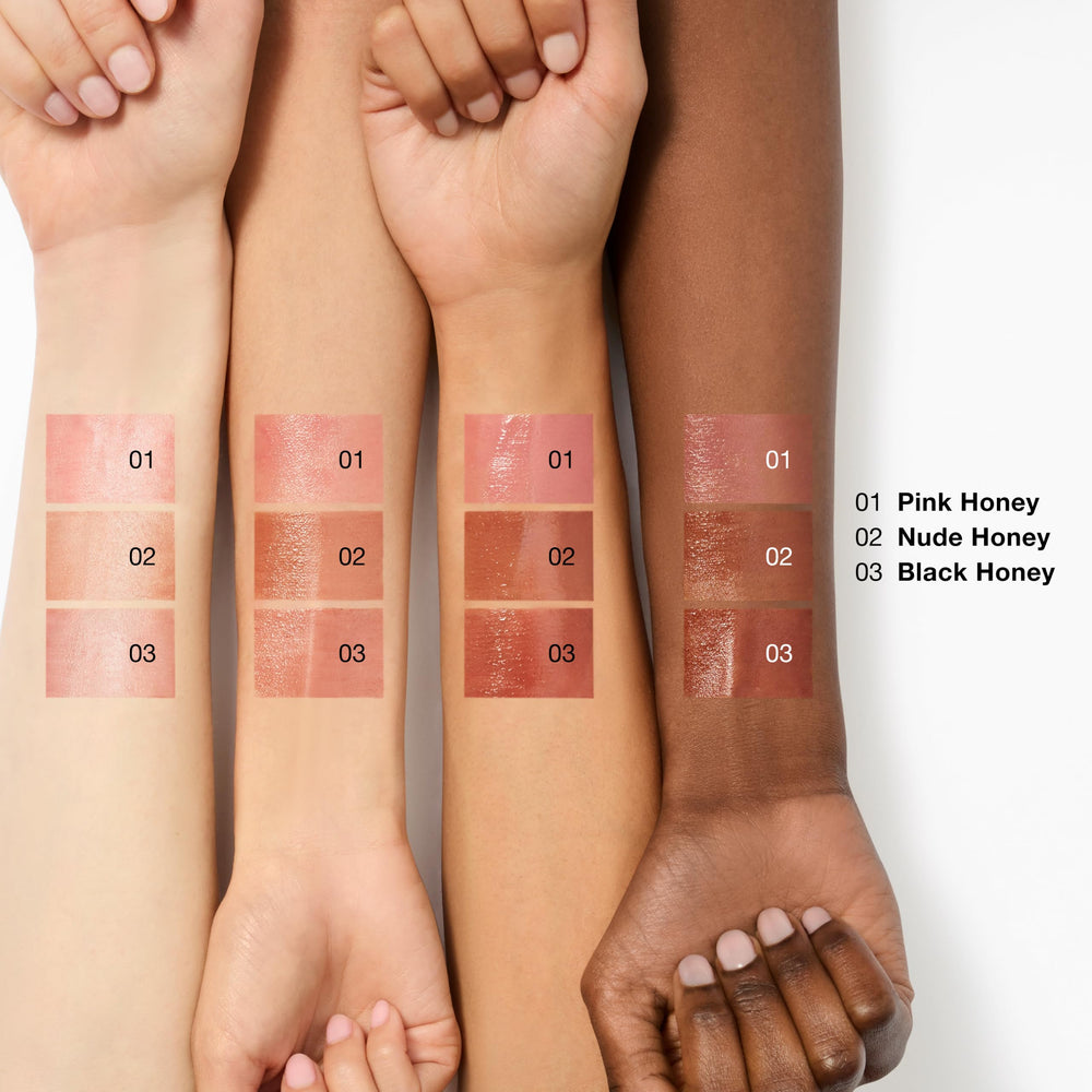 Clinique Black Honey next to other Clinique lip products showing layering options