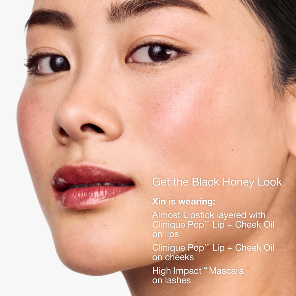 Clinique Black Honey in hand for scale demonstrating travel-friendly size