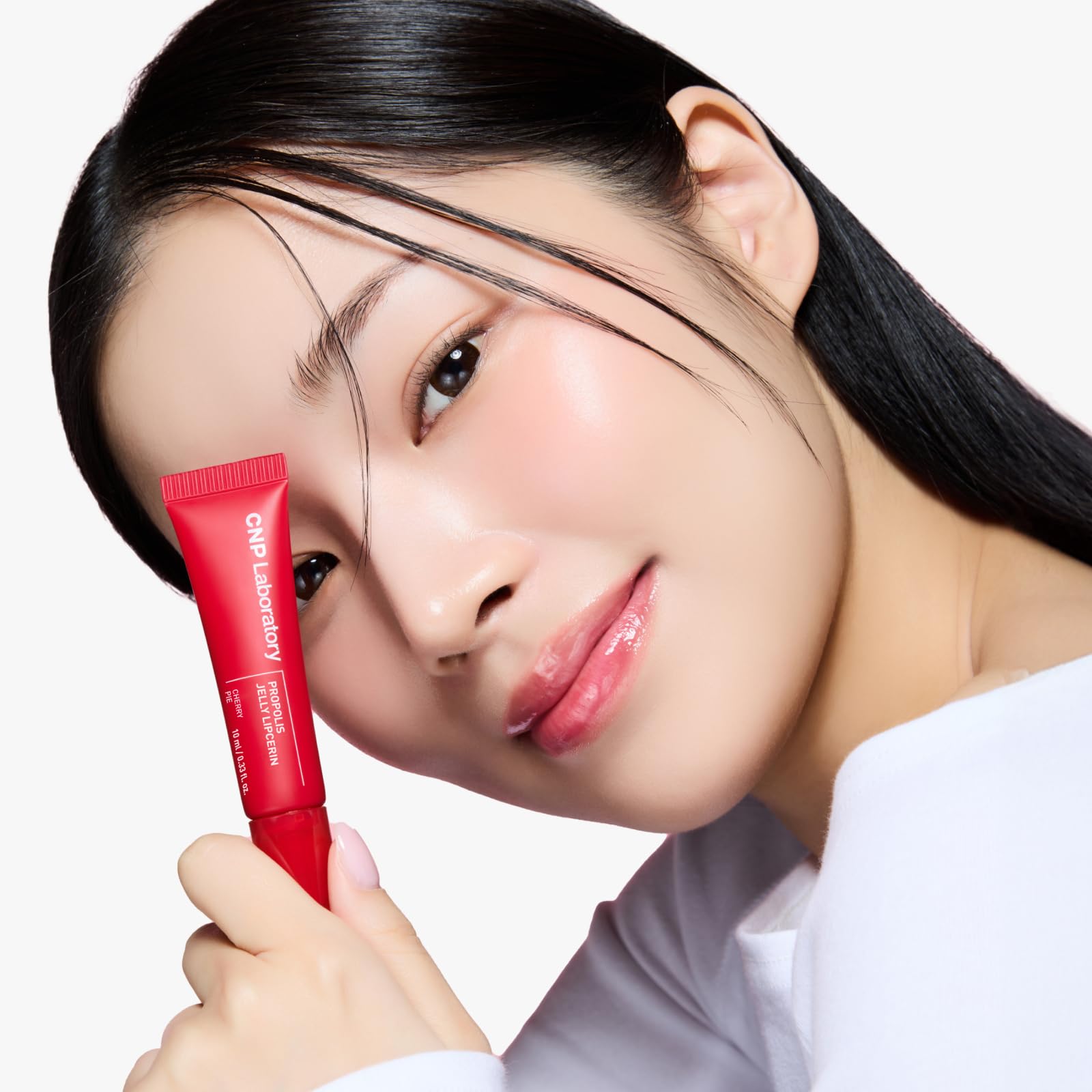 CNP Propolis Jelly Lipcerin Cherry Pie lip swatch highlights tinted shine and hydration.