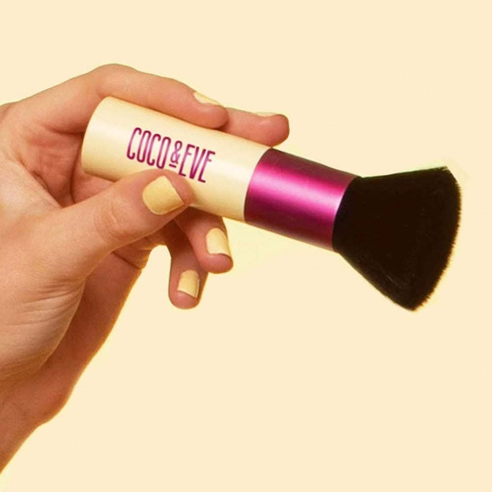 Coco & Eve Sunny Honey Bali Bronzing Bundle in-use moment shows fast-drying formula.