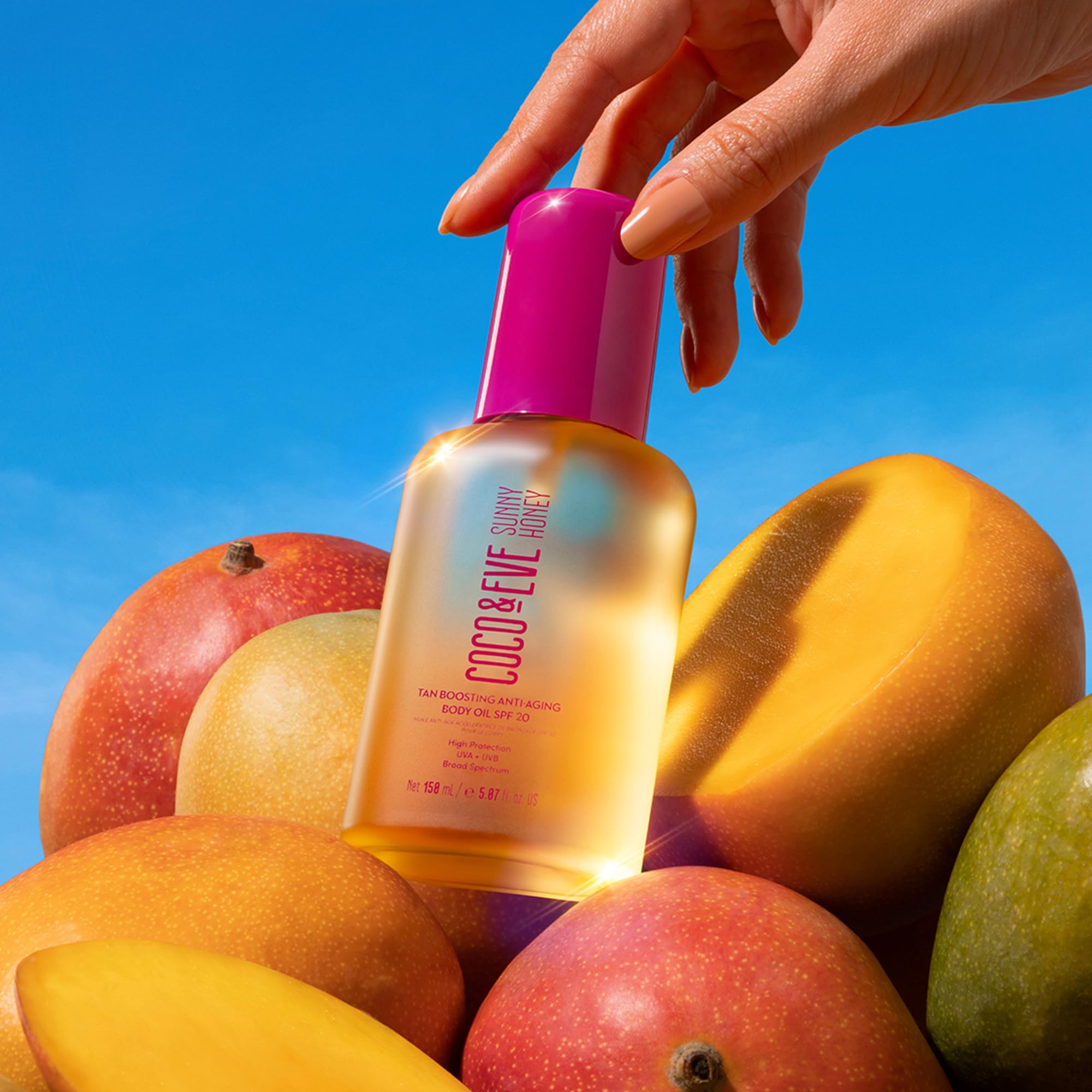 Coco & Eve Tan Boosting Oil on arm showing even skin coverage.