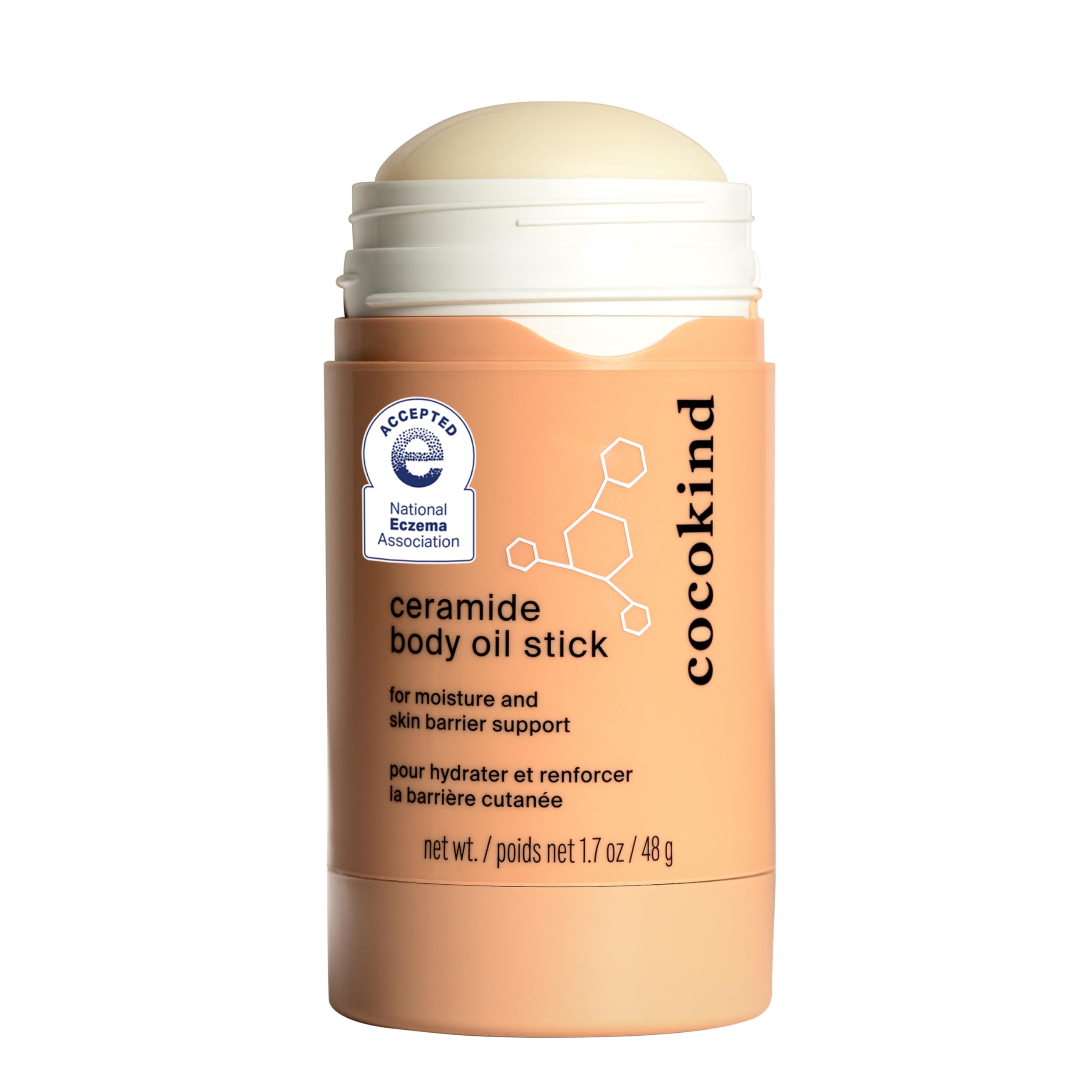 Cocokind Ceramide Body Oil Stick during application for mess-free hydration and barrier care.