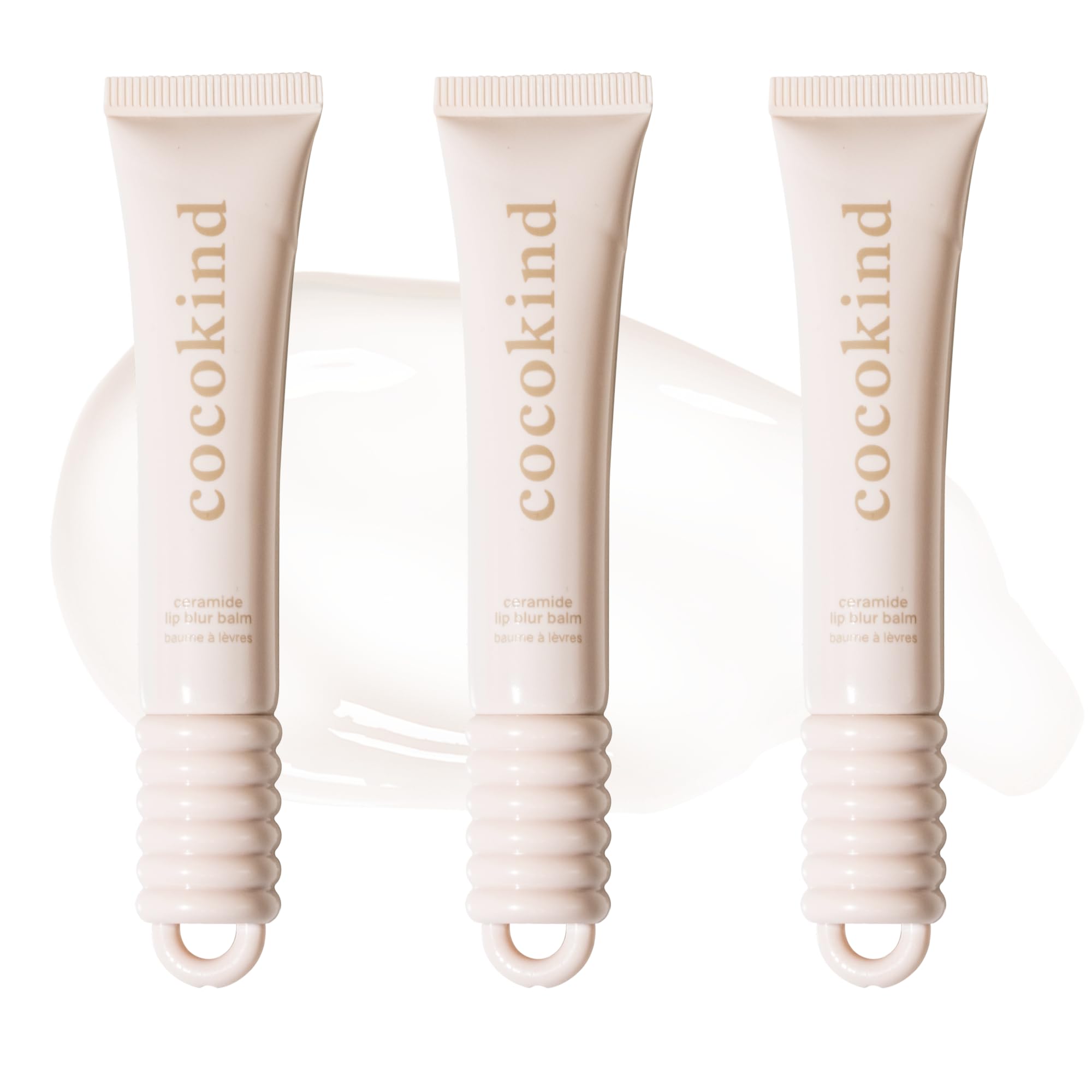 Cocokind Ceramide Lip Blur Balm in clear gloss hydrates lips.