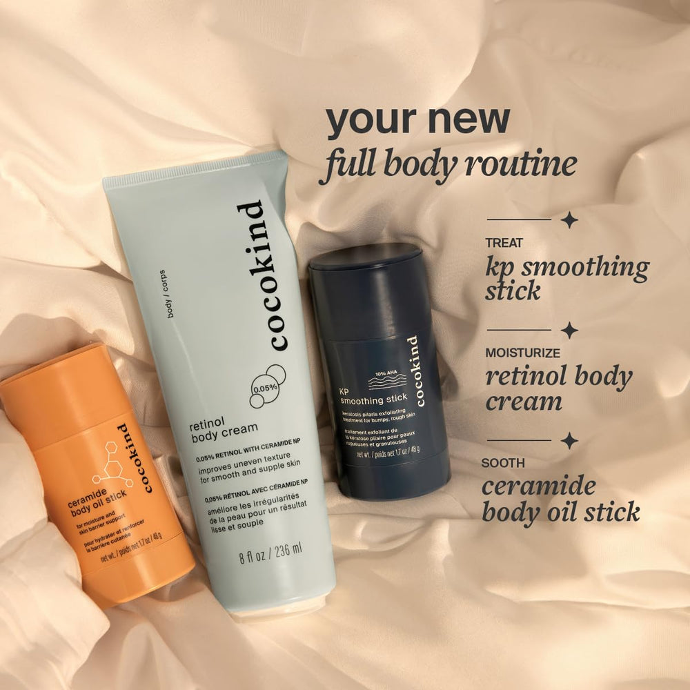 Cocokind KP Smoothing Stick gliding on dry skin for targeted exfoliation.