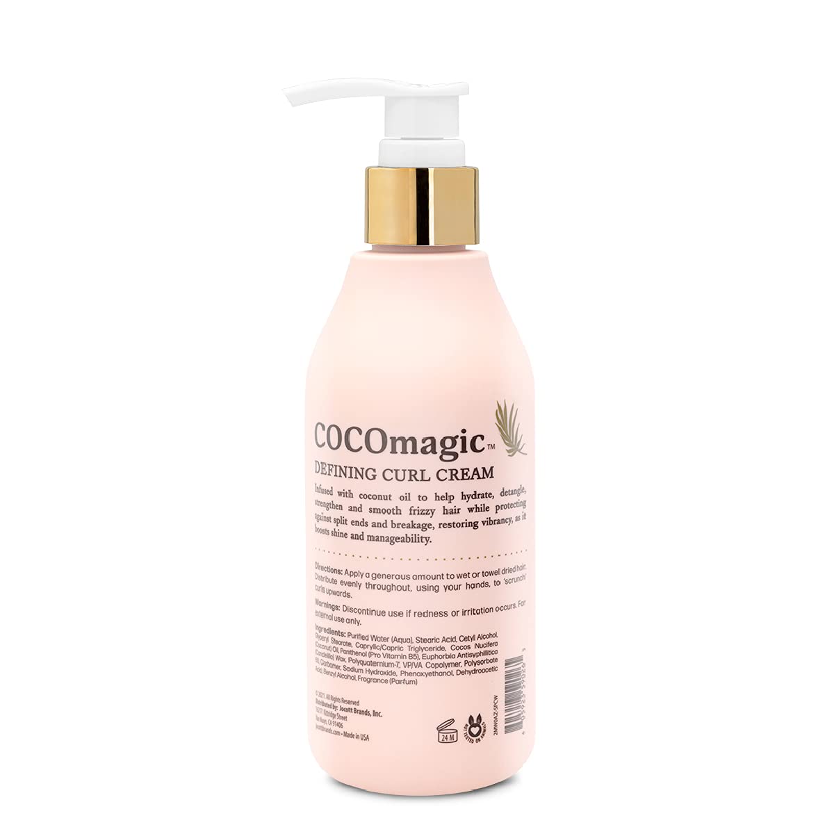 Cocomagic Defining Curl Cream applied to hair for detangling and definition.